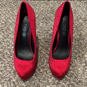 Aldo Sparkling Red rhinestone stiletto Heels. Excellent used condition.